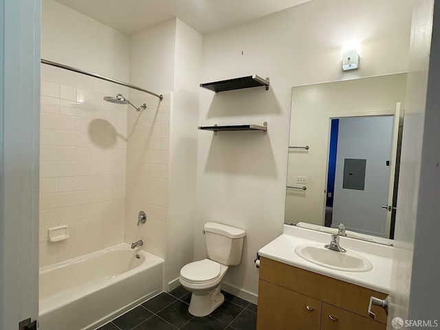 full bathroom with vanity, electric panel, tiled shower / bath combo, tile patterned floors, and toilet