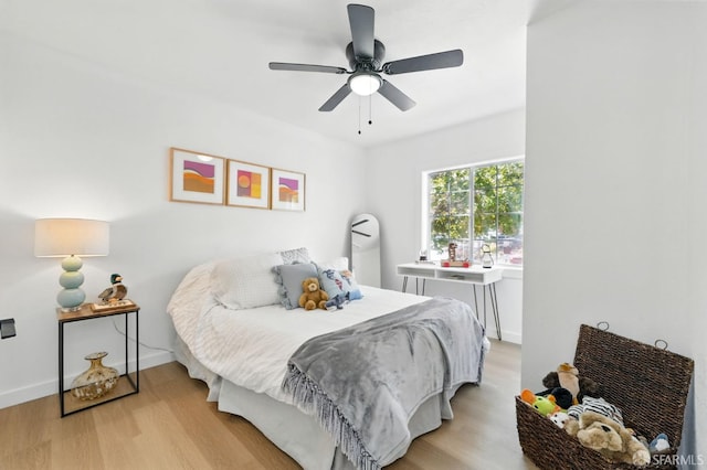 3901 La Colina Rd, El Sobrante, CA 94803 - bedroom featuring light wood finished floors, a ceiling fan, and baseboards