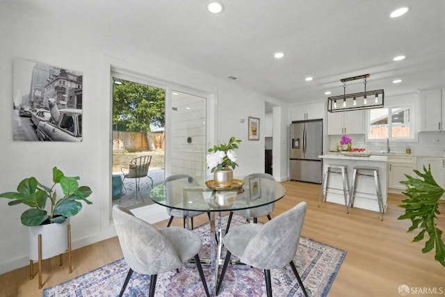 3901 La Colina Rd, El Sobrante, CA 94803 - dining space with plenty of natural light, light wood-style floors, recessed lighting, and baseboards