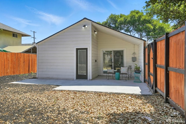 3901 La Colina Rd, El Sobrante, CA 94803 - back of property with a patio area and a fenced backyard