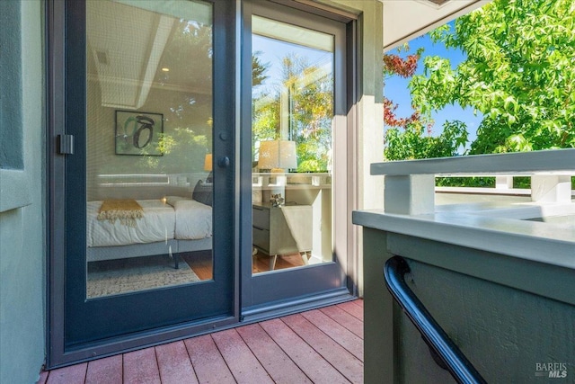 exterior space with plenty of natural light and hardwood / wood-style flooring