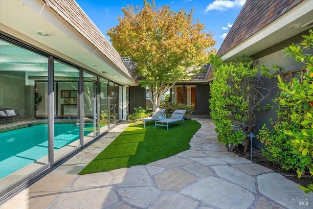 pool with a patio