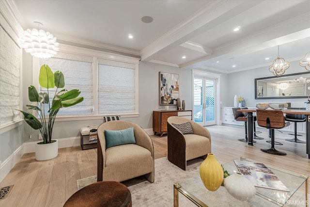 living area featuring ornamental molding, beam ceiling, wood finished floors, and a chandelier