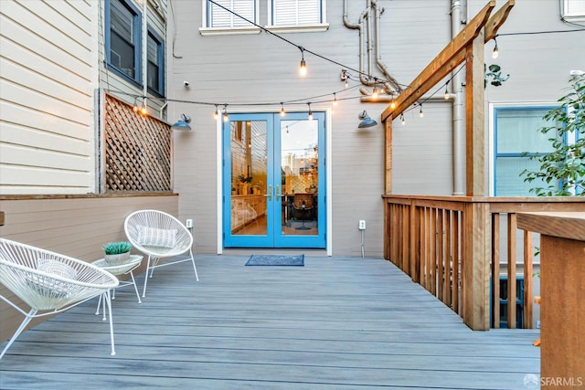 wooden terrace featuring french doors