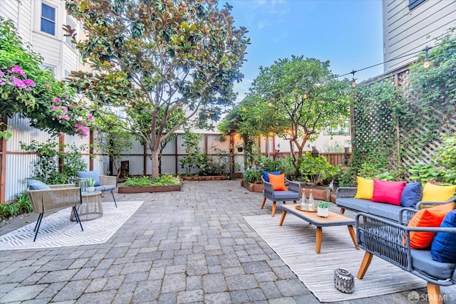 view of patio / terrace featuring a fenced backyard and an outdoor hangout area