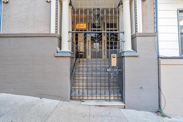 exterior space with brick siding