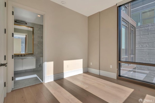 288 Pacific Ave Unit 4E, San Francisco, CA 94111 - unfurnished room with wood finished floors and a smoke detector