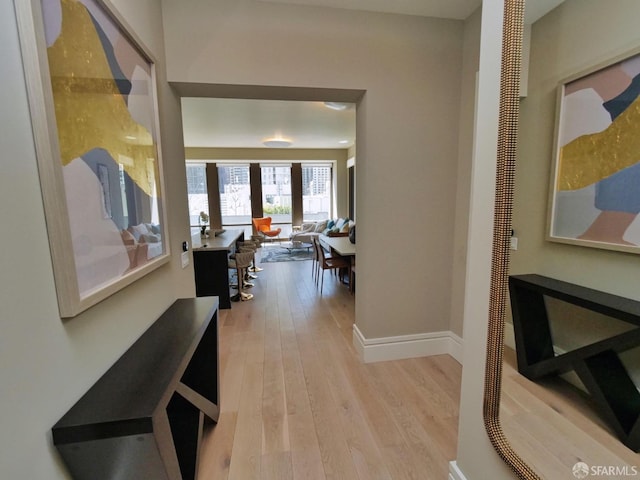 288 Pacific Ave Unit 4E, San Francisco, CA 94111 - hall featuring light wood-type flooring and baseboards