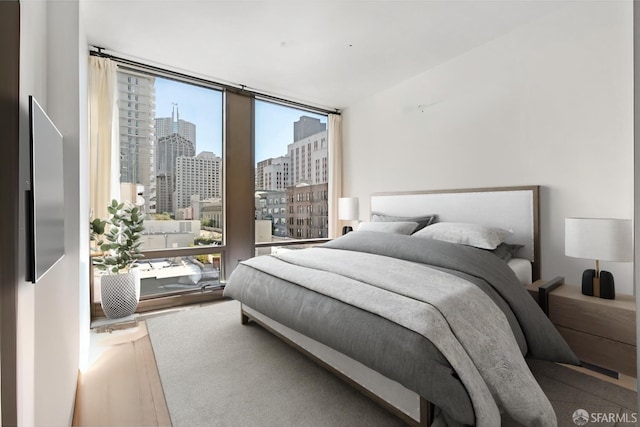 288 Pacific Ave Unit 4E, San Francisco, CA 94111 - bedroom with a city view and expansive windows
