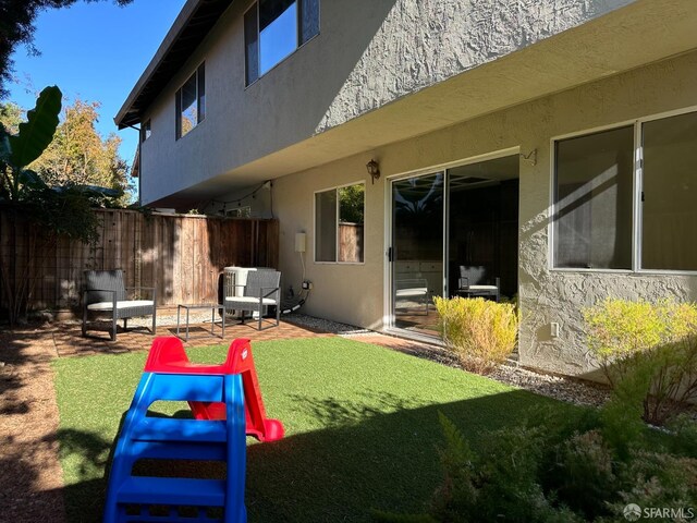 view of yard featuring a patio area and fence