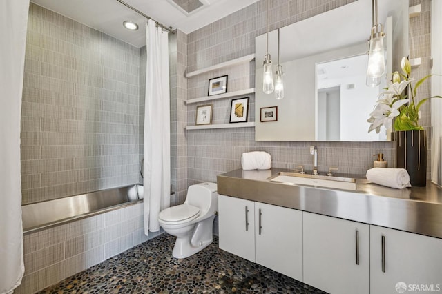 6 Mint Plz Unit 900A, San Francisco, CA 94103 - bathroom with tile walls, tiled shower / bath combo, vanity, and tasteful backsplash