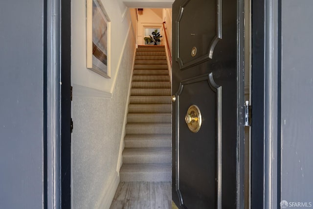350 Dolores St, San Francisco, CA 94110 - staircase featuring wood finished floors