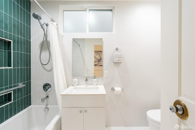 350 Dolores St, San Francisco, CA 94110 - full bathroom featuring vanity, toilet, tile walls, and shower / bath combo with shower curtain
