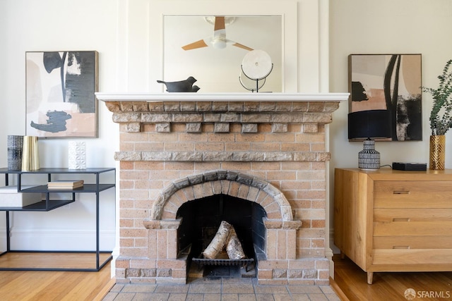 350 Dolores St, San Francisco, CA 94110 - room details with a brick fireplace, ceiling fan, and wood finished floors
