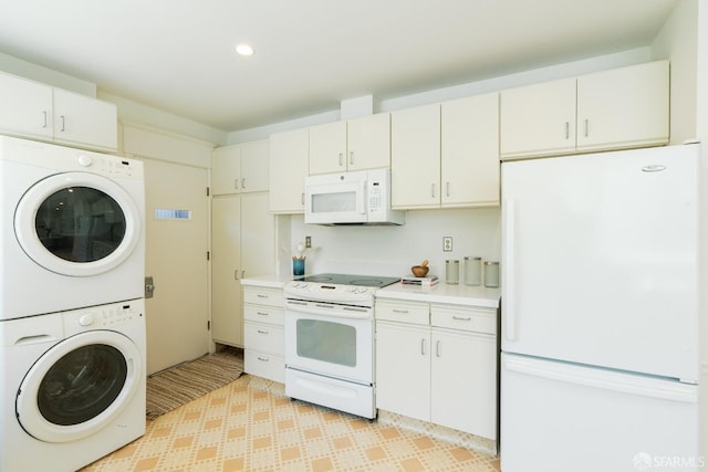 350 Dolores St, San Francisco, CA 94110 - kitchen featuring light countertops, recessed lighting, stacked washer and dryer, and white appliances