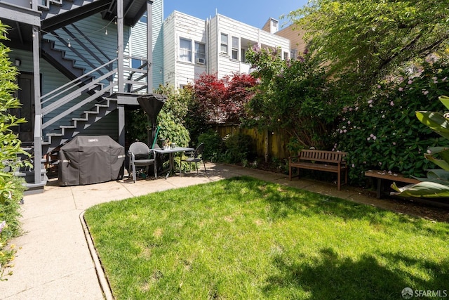 350 Dolores St, San Francisco, CA 94110 - view of yard with fence, stairs, and a patio
