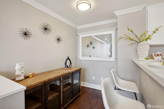 office area featuring crown molding and dark hardwood / wood-style flooring