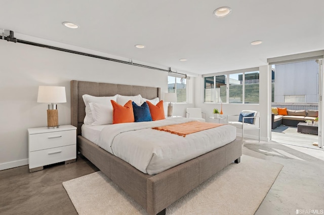 bedroom with concrete flooring