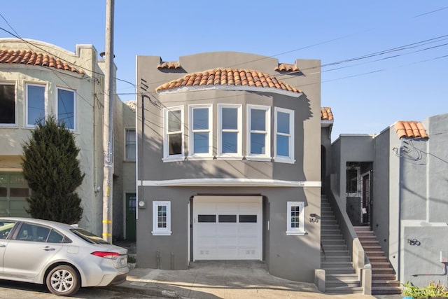 view of front of property featuring a garage