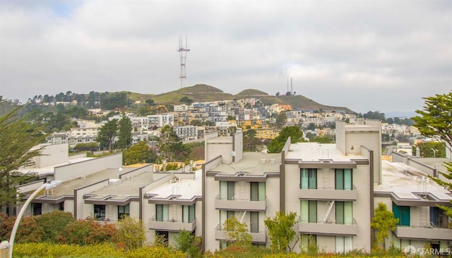 view of building exterior featuring a mountain view