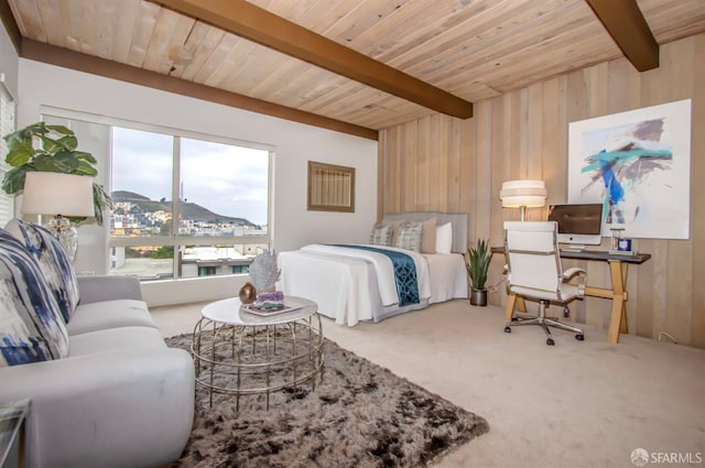 bedroom with wooden ceiling, carpet, beam ceiling, and wooden walls