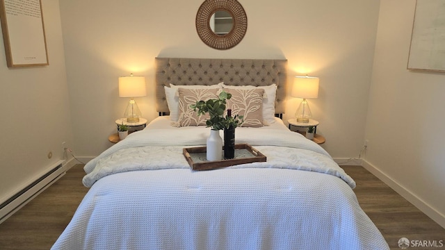 505 Cypress Point Dr Unit 40, Mountain View, CA 94043 - bedroom featuring a baseboard radiator, baseboards, and dark wood finished floors