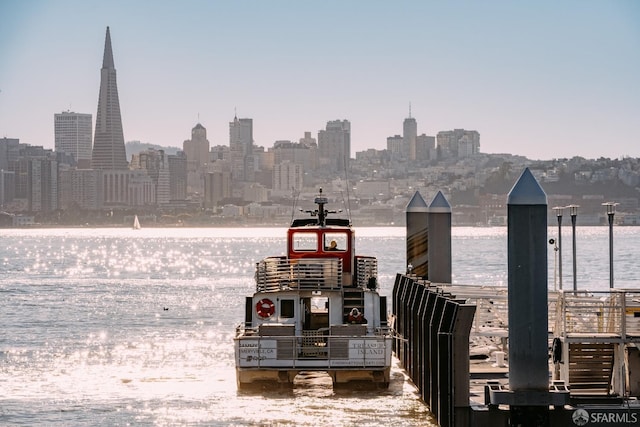 property's view of city featuring a water view