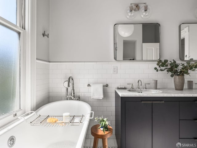 1850 Laguna St, San Francisco, CA 94115 - bathroom with a freestanding bath, vanity, and tile walls