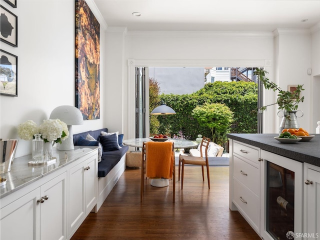 1850 Laguna St, San Francisco, CA 94115 - dining area with wine cooler, dark wood-type flooring, and ornamental molding