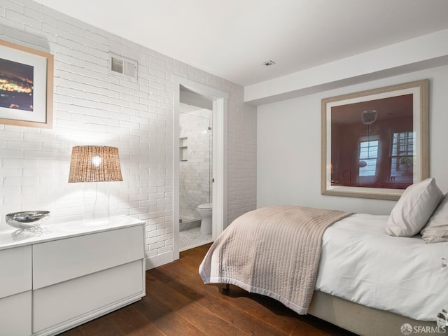 1850 Laguna St, San Francisco, CA 94115 - bedroom with dark wood-type flooring and ensuite bathroom