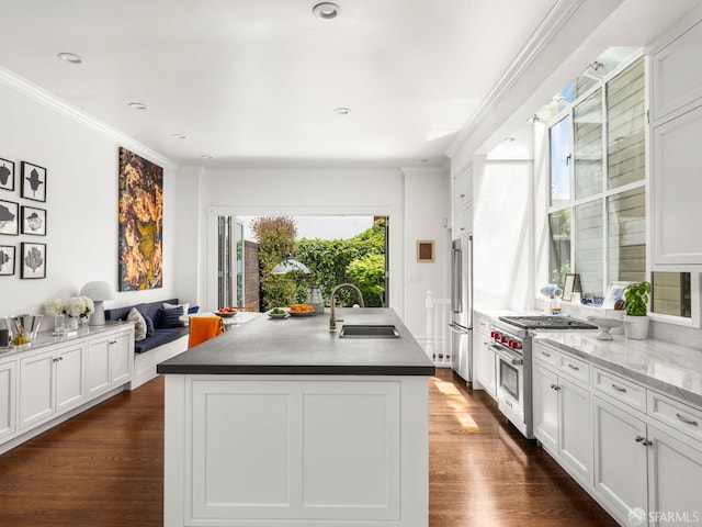 1850 Laguna St, San Francisco, CA 94115 - kitchen featuring a sink, appliances with stainless steel finishes, dark wood-type flooring, ornamental molding, and white cabinetry