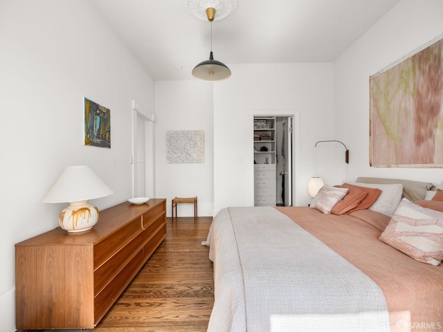 1850 Laguna St, San Francisco, CA 94115 - bedroom featuring wood finished floors and a spacious closet
