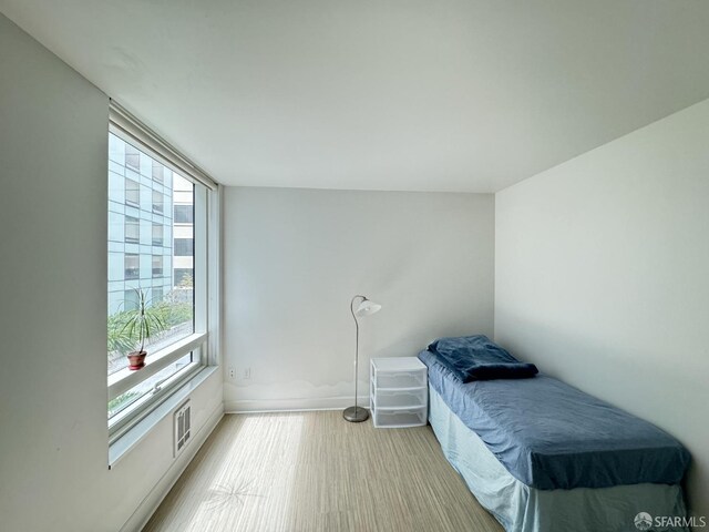 bedroom featuring light hardwood / wood-style floors