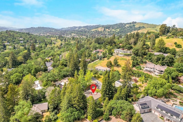 birds eye view of property featuring a mountain view