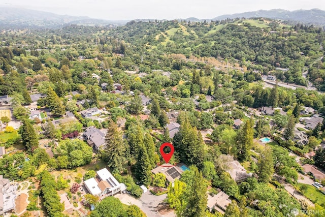 birds eye view of property featuring a mountain view