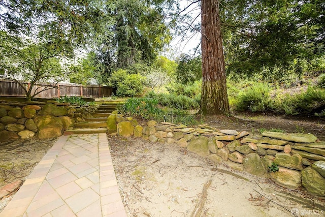 view of yard featuring fence