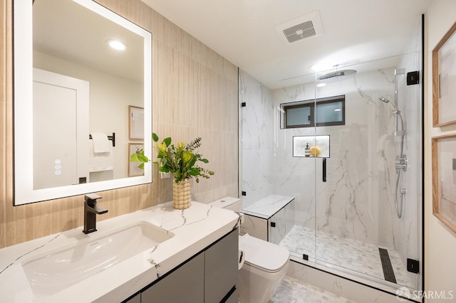 1935-1937 Greenwich St, San Francisco, CA 94123 - bathroom featuring visible vents, toilet, vanity, and a marble finish shower