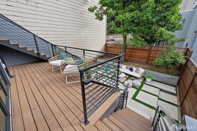 1935-1937 Greenwich St, San Francisco, CA 94123 - wooden deck with a patio area, fence, and an outdoor hangout area