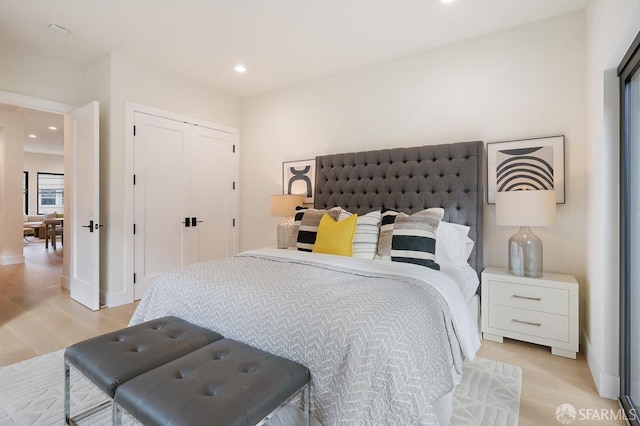 1935-1937 Greenwich St, San Francisco, CA 94123 - bedroom featuring baseboards, a closet, recessed lighting, and light wood-style floors