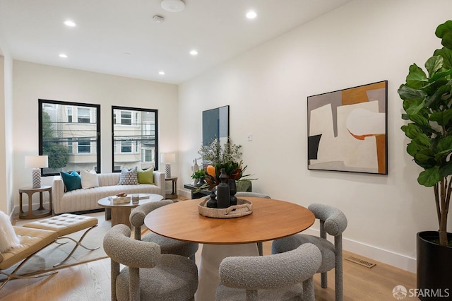1935-1937 Greenwich St, San Francisco, CA 94123 - dining room with light wood-style floors, visible vents, and recessed lighting