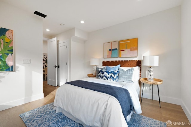 1935-1937 Greenwich St, San Francisco, CA 94123 - bedroom with a closet, recessed lighting, wood finished floors, and baseboards