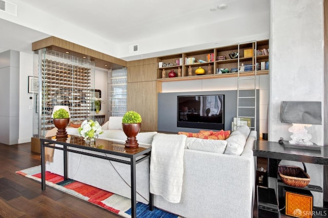 living room featuring dark hardwood / wood-style floors