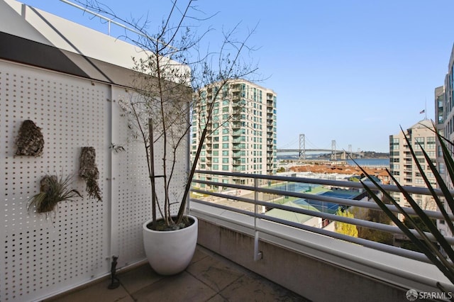 balcony featuring a water view