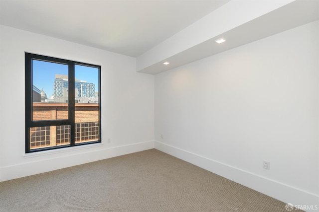 1288 Howard St Unit 418, San Francisco, CA 94103 - unfurnished room featuring light carpet, baseboards, and recessed lighting
