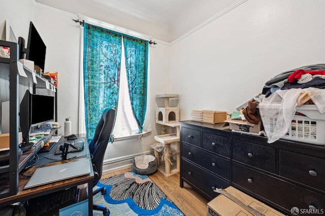 office area with crown molding and wood finished floors