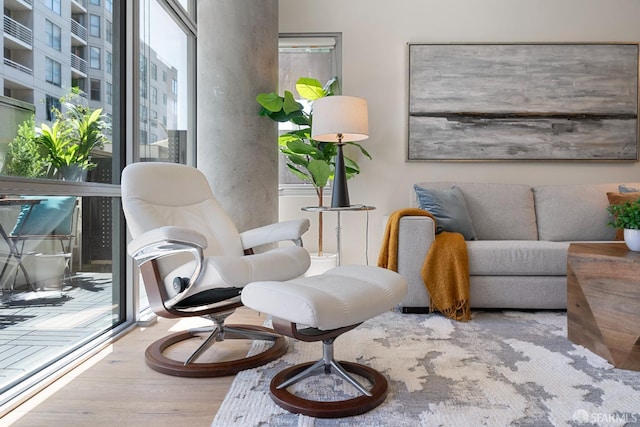 72 Townsend St Unit 302, San Francisco, CA 94107 - sitting room featuring wood finished floors