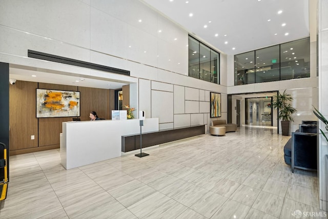 72 Townsend St Unit 302, San Francisco, CA 94107 - welcome area featuring a towering ceiling and wooden walls