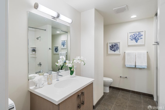 72 Townsend St Unit 302, San Francisco, CA 94107 - bathroom featuring toilet, baseboards, vanity, a shower, and recessed lighting