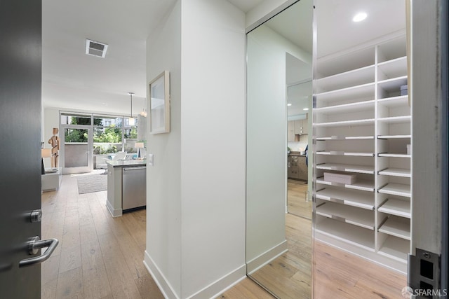 72 Townsend St Unit 302, San Francisco, CA 94107 - hallway featuring hardwood / wood-style flooring