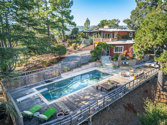 view of swimming pool featuring a patio